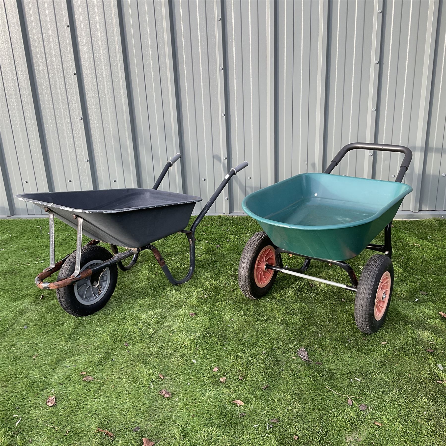 Pair of single and two tire metal wheelbarrows
