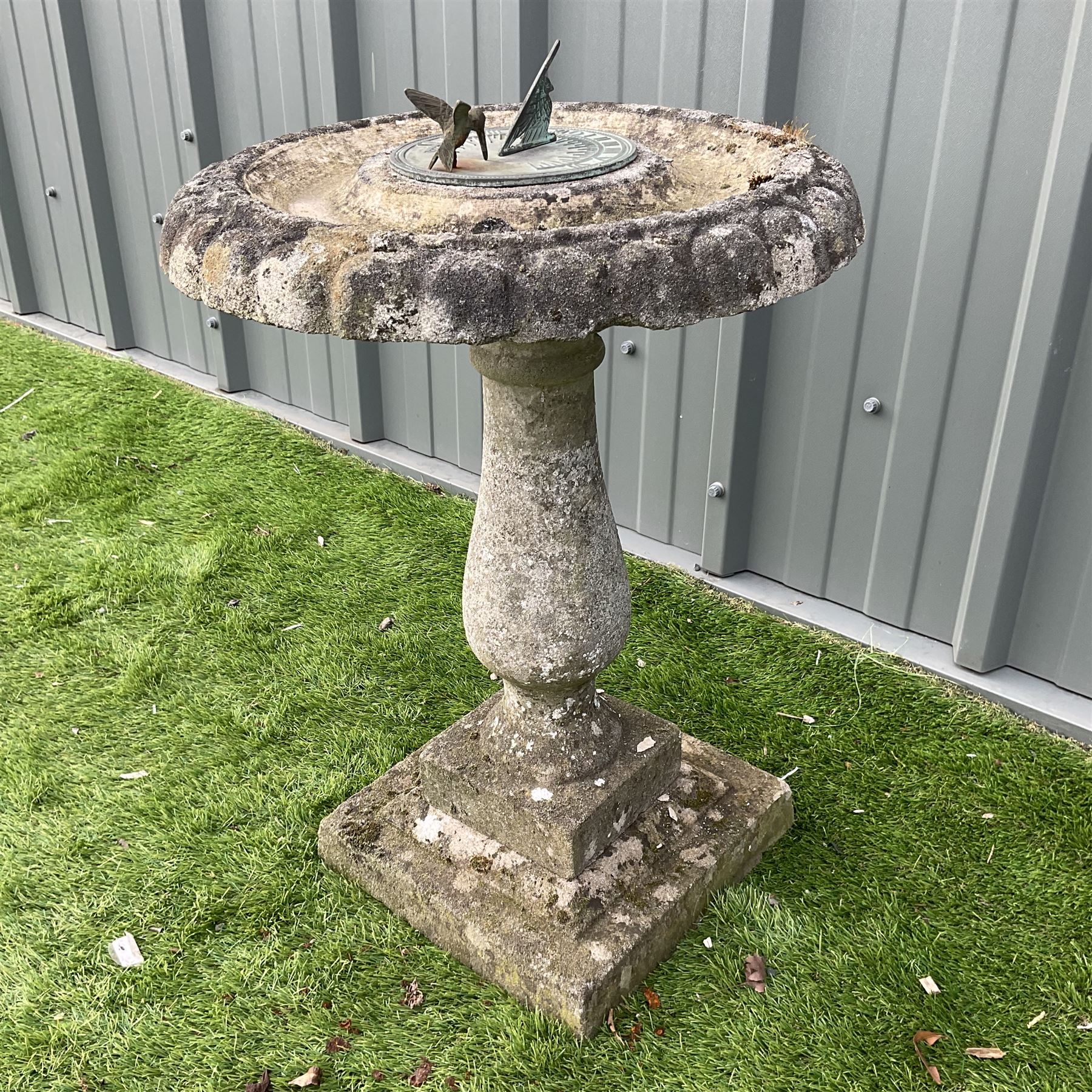 Cast stone sun dial on pedestal base