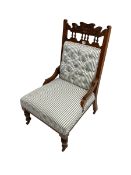 Late Victorian nursing chair upholstered in striped fabric