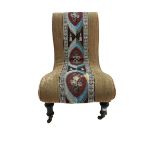 Victorian shaped nursing chair upholstered in needle work fabric