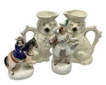 Pair of Staffordshire style dog jugs and other Staffordshire style figures
