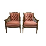 Pair stained beech framed bergere armchairs