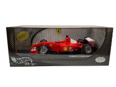 Hot Wheels Racing 1:18 scale diecast Michael Schumacher F2002 Ferrari Formula One car