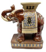 Oriental style ceramic garden seat in the form of an elephant