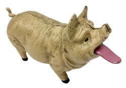 Cast iron mechanical money bank in the form of a pig