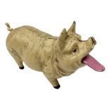 Cast iron mechanical money bank in the form of a pig