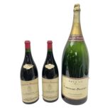 Three oversized champagne display/advertising bottles