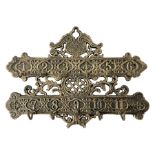 Bronzed cast metal numbered key rack of pierced and scrolled design