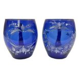 Pair of Victorian cobalt blue glass cups with gilt and painted decoration