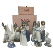 Collection of nine Nao figures