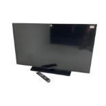 Samsung television with remote 35"