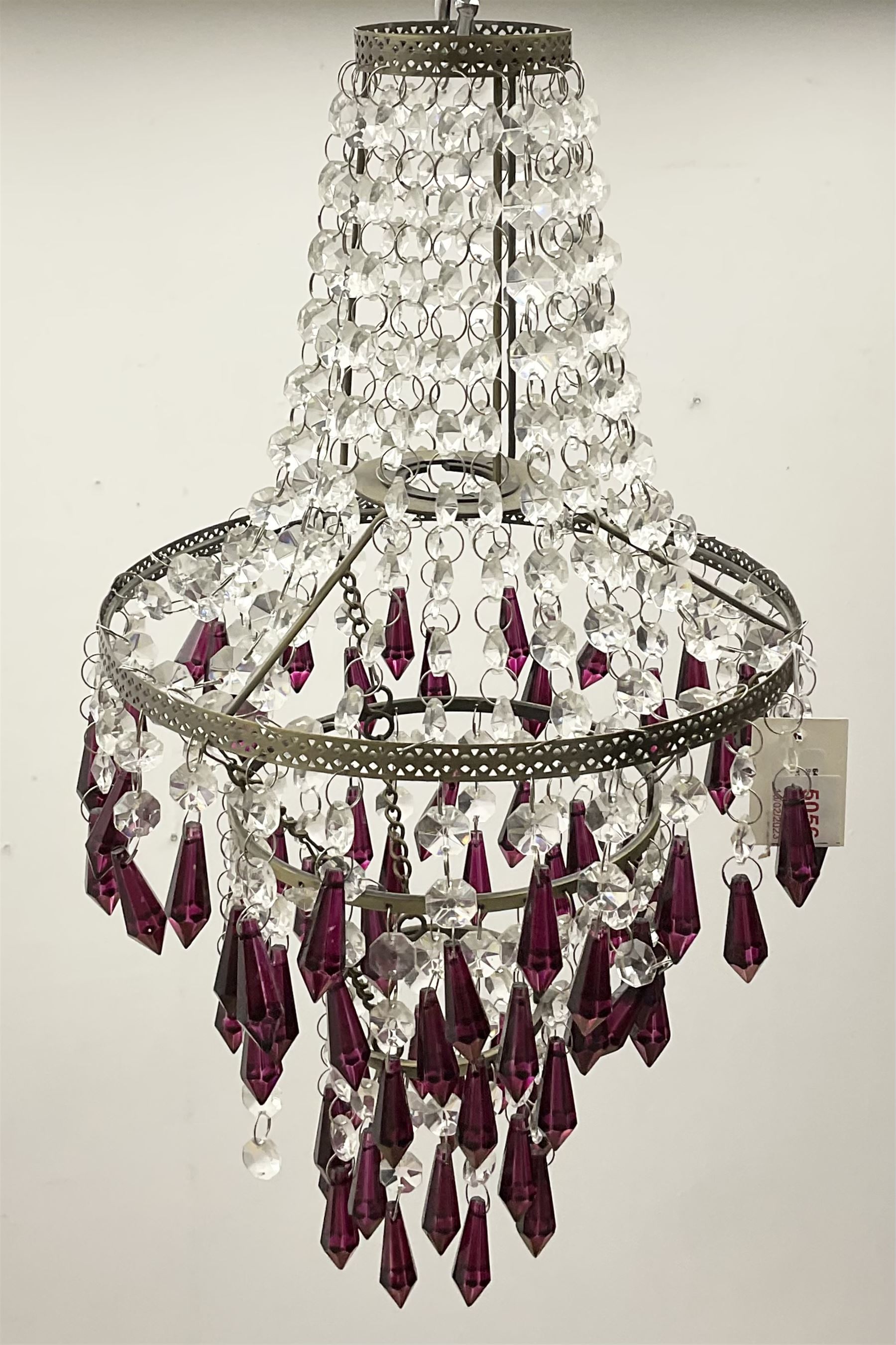 Small glass chandelier with deep red drops