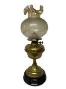 Brass oil lamp with frilled glass shade