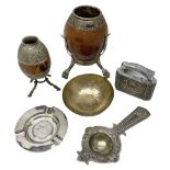 Yerba mate tea gourd calabash cup with silver-plated foliate mounts raised upon three hoof feet