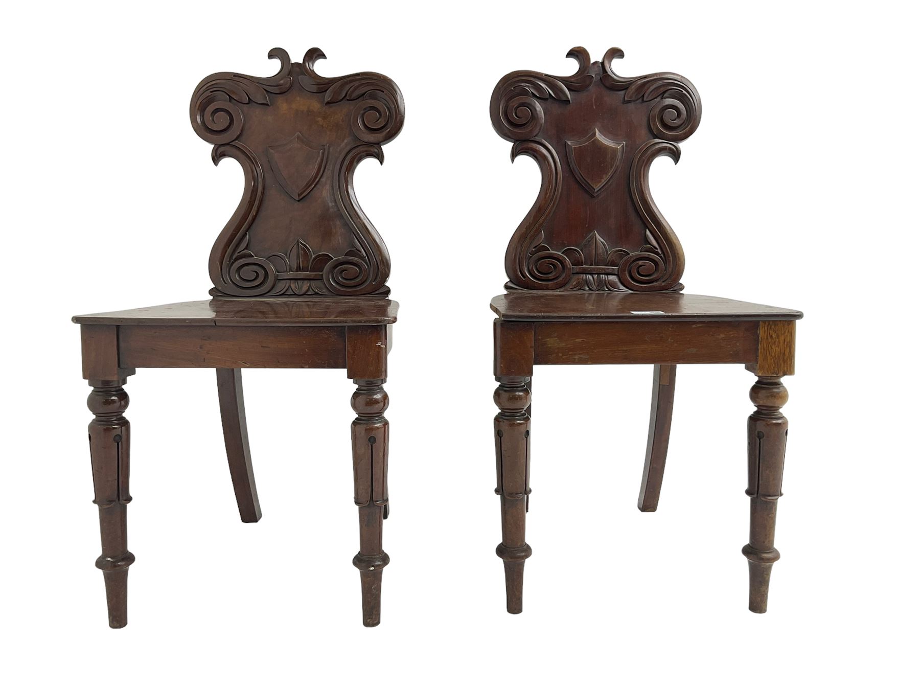 Pair 19th century walnut and mahogany hall chairs