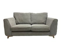 Two seat sofa upholstered in graphite grey fabric