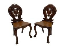 Pair late 19th century mahogany hall chairs