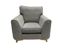 Armchair upholstered in graphite grey fabric