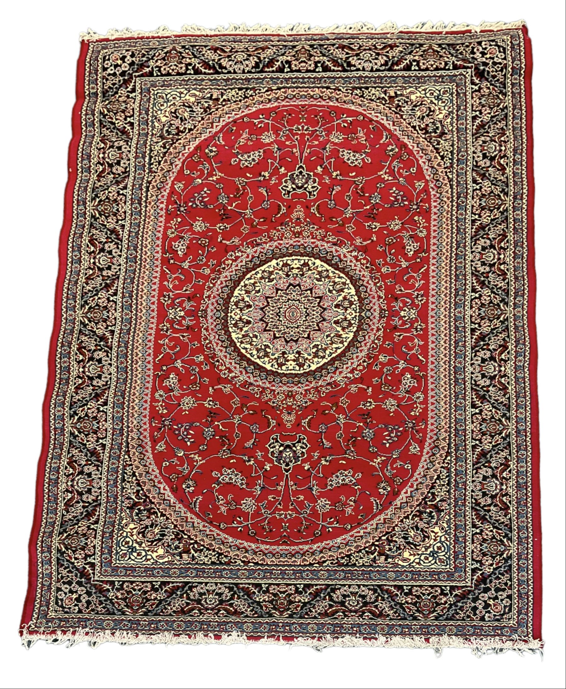 Persian red ground rug