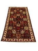 Persian Bakhtiari burgundy and ivory ground rug