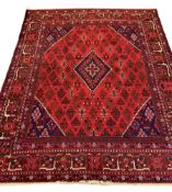 Central Persian Josheghan red ground carpet