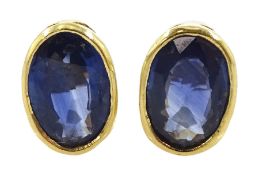 Pair of 18ct gold single stone oval sapphire stud earrings