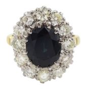 18ct gold and platinum oval sapphire and round brilliant cut diamond cluster ring