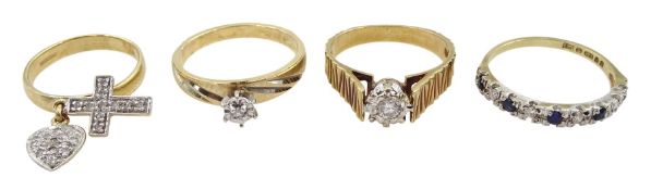 Two gold single stone diamond rings