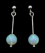 Pair of silver single stone opal pendant stud earrings