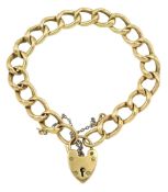10ct gold curb link bracelet with 9ct gold heart locket clasp