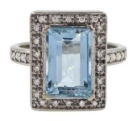 White gold baguette cut aquamarine and round brilliant cut diamond ring