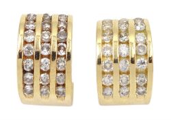 Pair of 14ct gold channel set