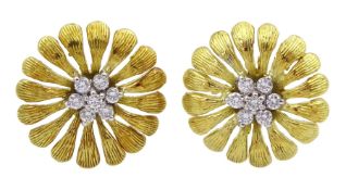 Pair of 18ct gold round brilliant cut diamond daisy stud earrings