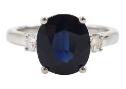 18ct white gold three stone oval mix cut sapphire and round brilliant cut diamond ring