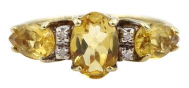 9ct gold three stone oval and pear shaped citrine and diamond ring