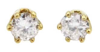 Pair of 18ct gold round brilliant cut diamond stud earrings