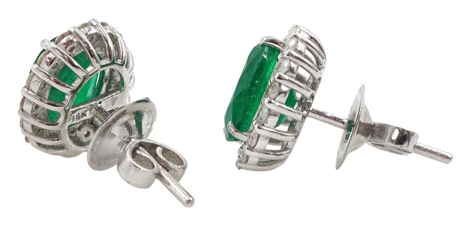 Pair of 18ct white gold oval emerald and round brilliant cut diamond cluster stud earrings - Image 2 of 2