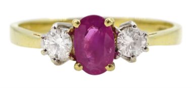 18ct gold three stone oval ruby and round brilliant cut diamond ring