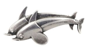 Silver double dolphin brooch designed by Georg Jensen
