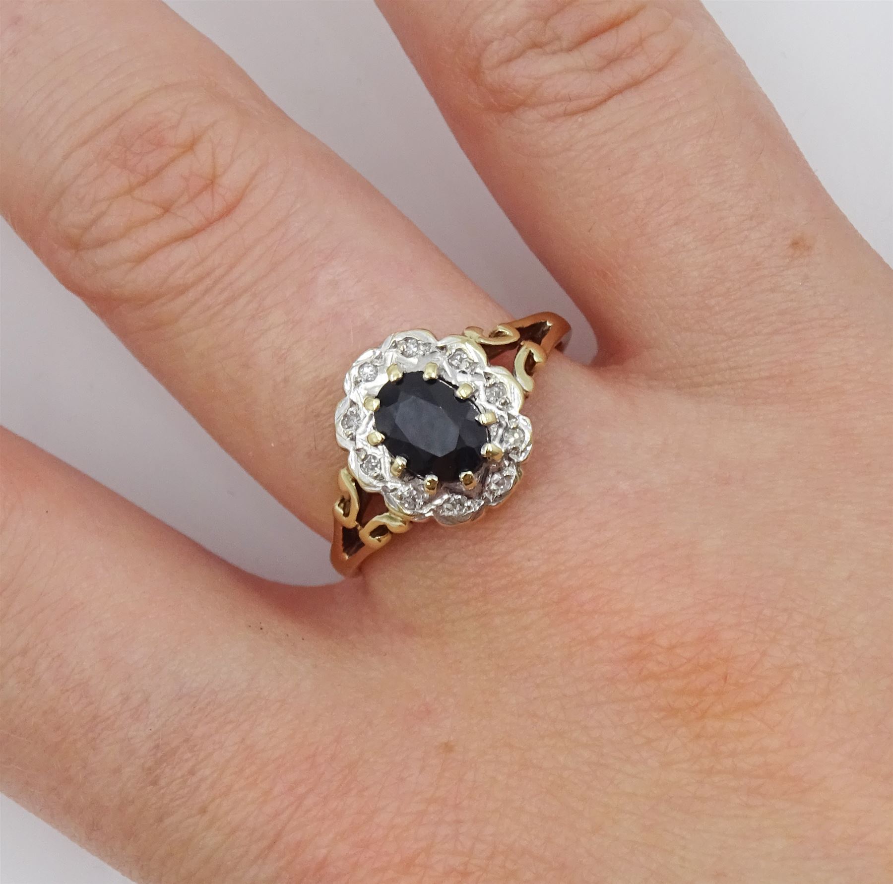 9ct gold oval sapphire and diamond cluster ring with pierced shoulders - Image 2 of 4