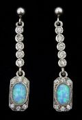 Pair of silver opal and cubic zirconia pendant stud earrings