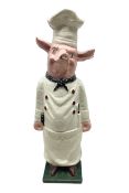 20th century painted cast iron door stop modelled as a pig chef