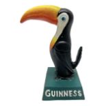 Reproduction cast iron Guinness toucan
