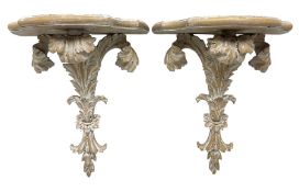 Pair of Rococo style carved wood wall brackets