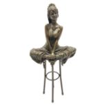 Art Deco style bronze modelled as a female figure seating crossed legged upon a chair