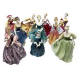 Nine Royal Doulton figures