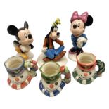 Three Royal Doulton The Mickey Mouse Collection figurines comprising Mickey Mouse MM1
