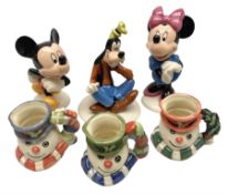 Three Royal Doulton The Mickey Mouse Collection figurines comprising Mickey Mouse MM1