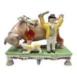 Staffordshire style figure 'Bull Beating