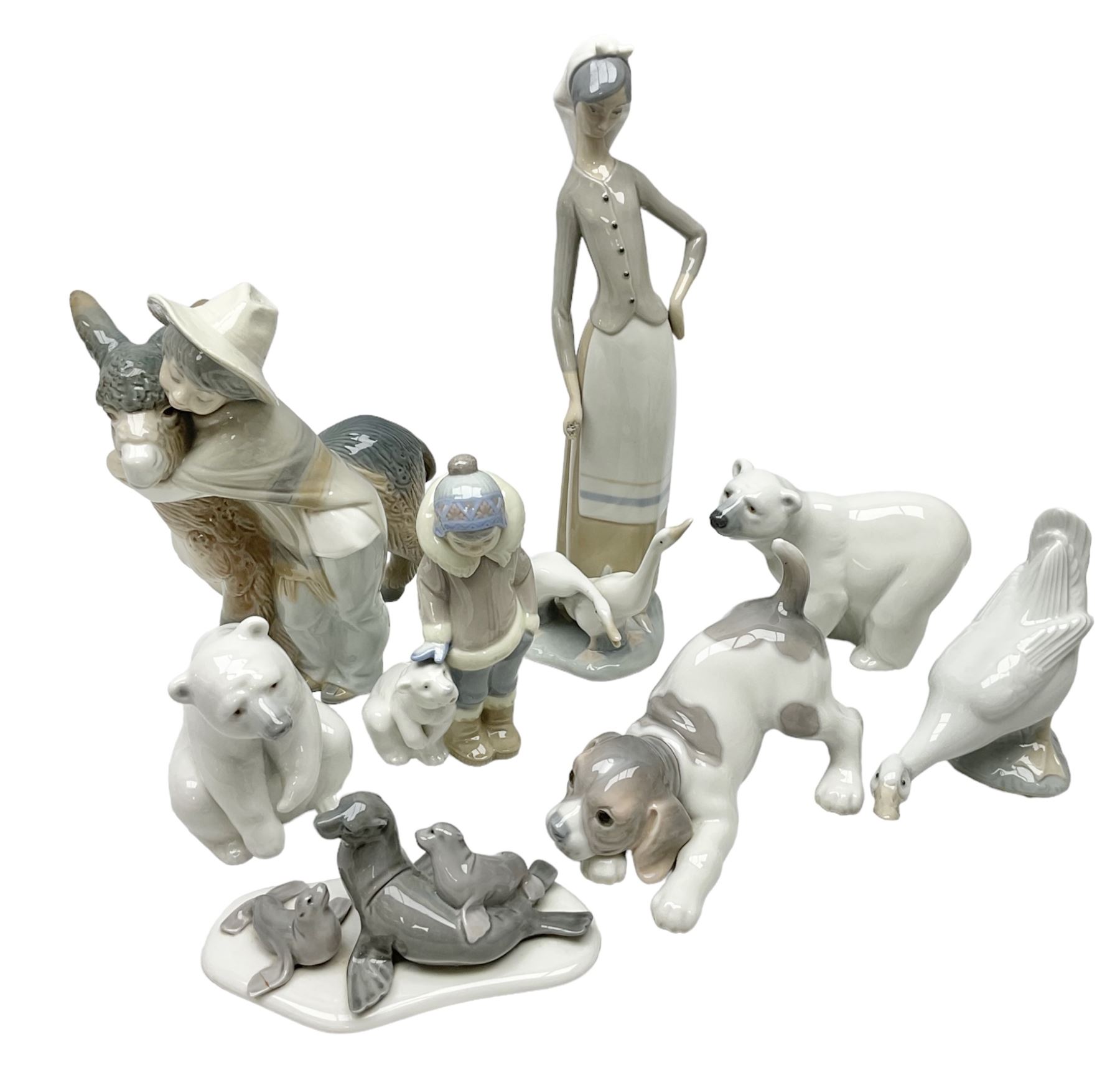 Seven Lladro figures